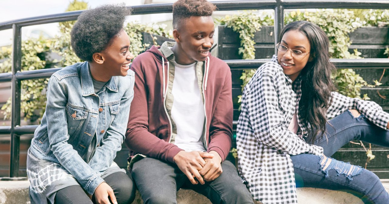 Three black teens hang out