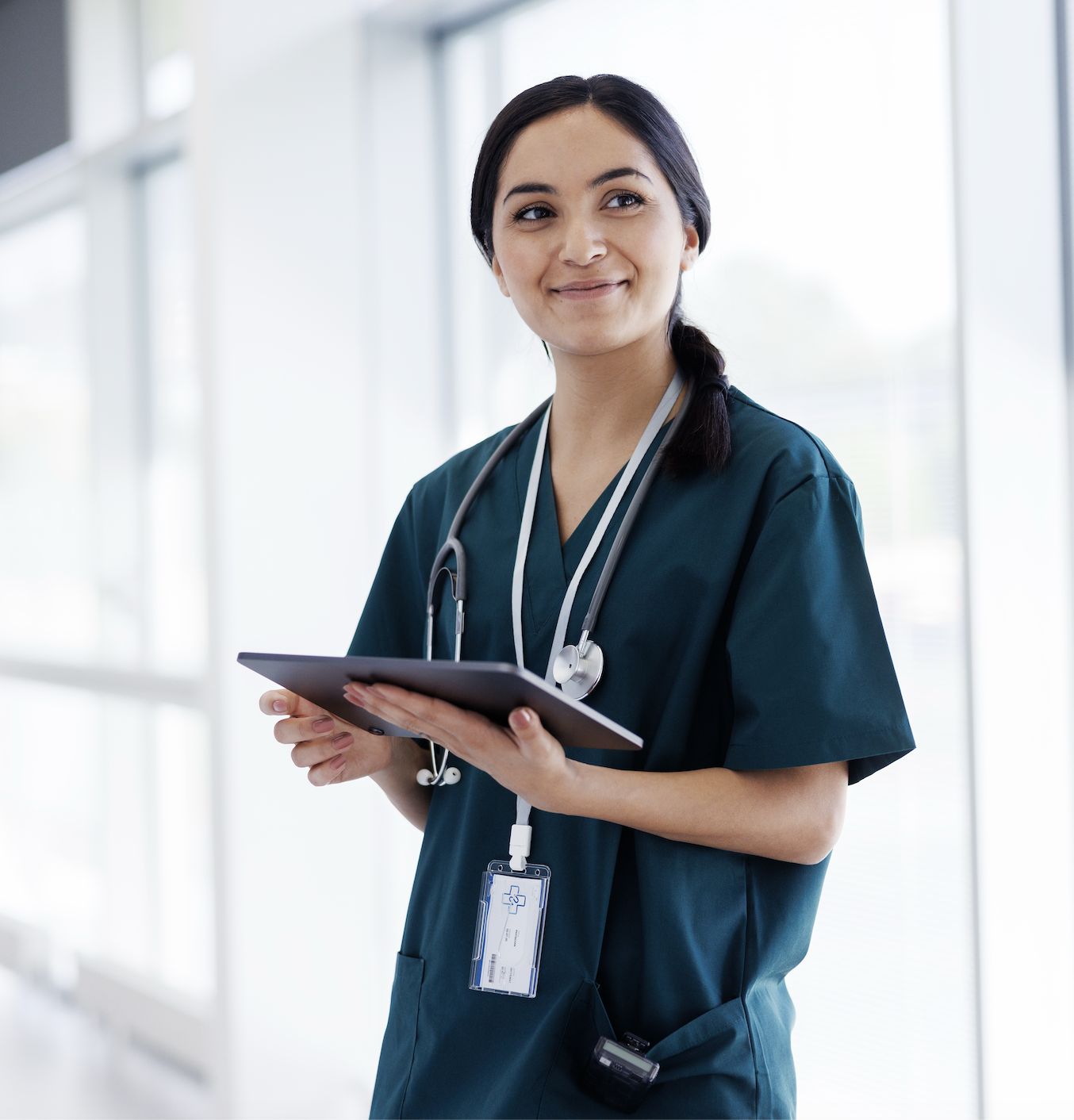 Health care professional woman in scrubs smiling