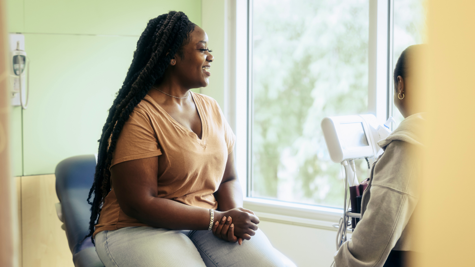 Woman sitting in doctor's office