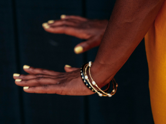 woman holding out her hands