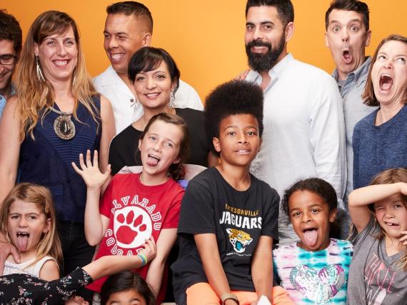 A team photo of Bloom Science alongside their children. 